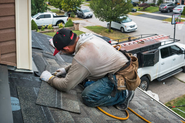 Professional Gutter Repair And Installation technician working in Haledon, NJ